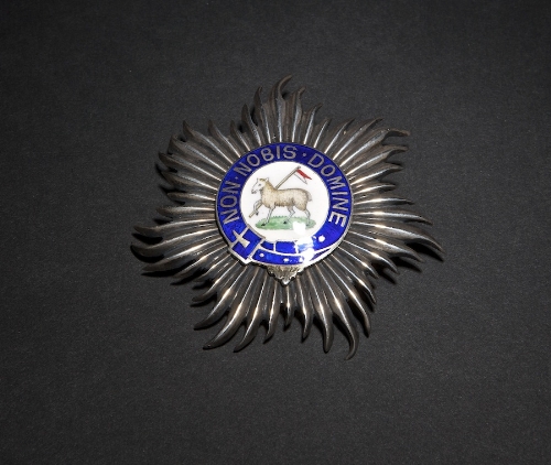 A MASONIC SILVER JEWEL, in the form of a star, Order of the Knights Templar, the central enamel
