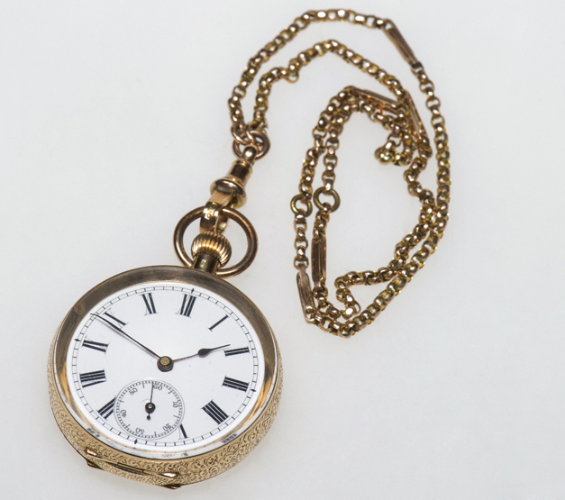 A 14ct GOLD POCKET WATCH, stamped “14k”, circular dial with white enamel dial, Roman numerals and