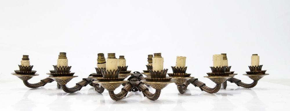 OSKAR KAUFMANN: A SET OF SIX TWIN-LIGHT BRONZE SCONCES, each with leaf and scale-cast scrolling