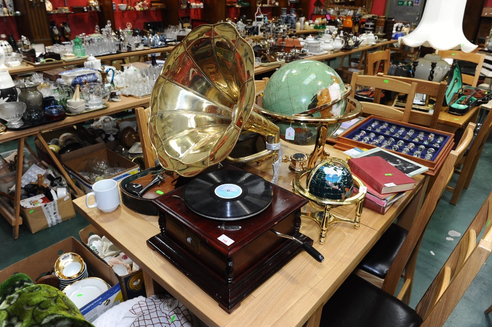 A reproduction His Masters Voice wind-up gramophone with brass horn