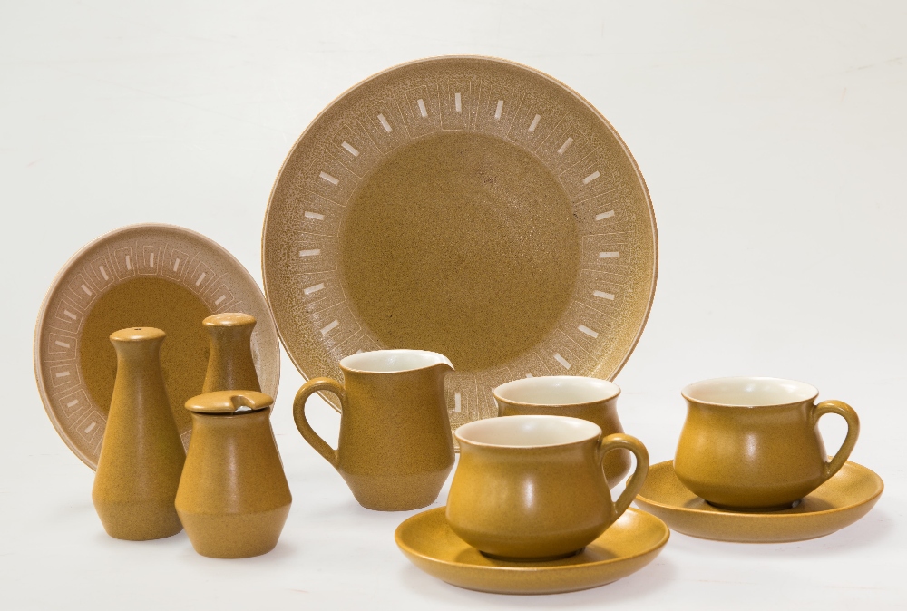 A Denby China stone coloured breakfast set, circa 1970 for twelve settings including cups,