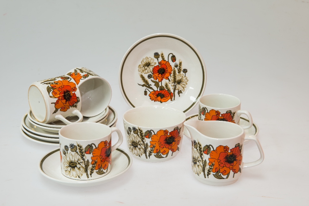 A J & G Meakin `Poppy` pattern part tea set comprising four cups, saucers,  plates,  a sugar bowl