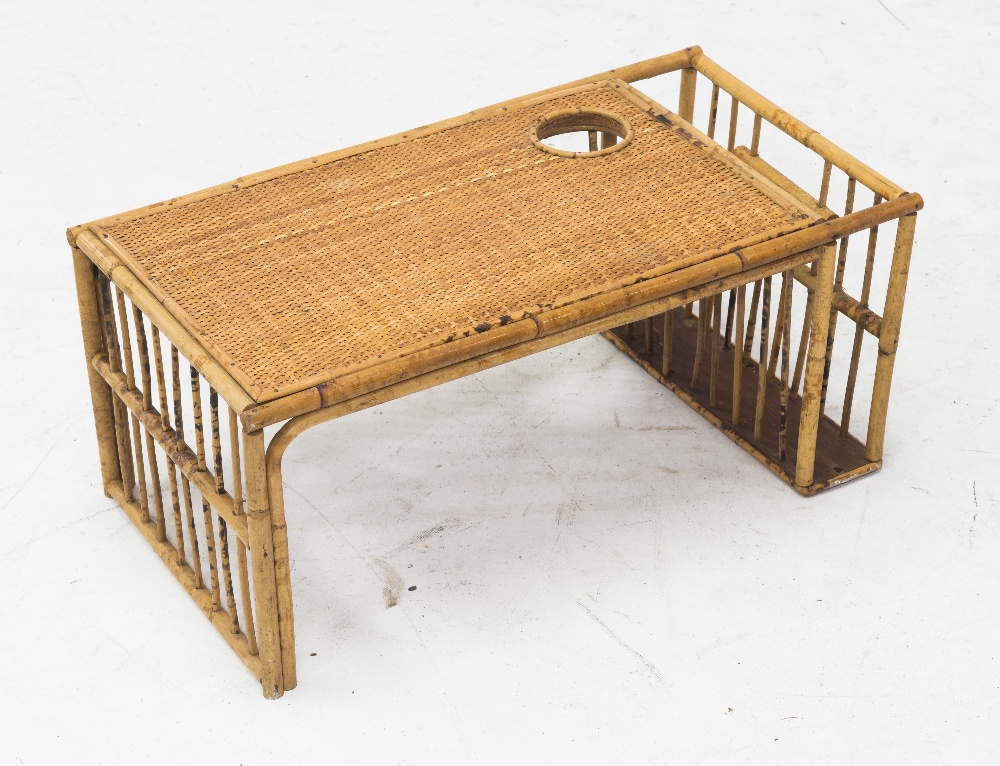 A vintage rattan bed tray table