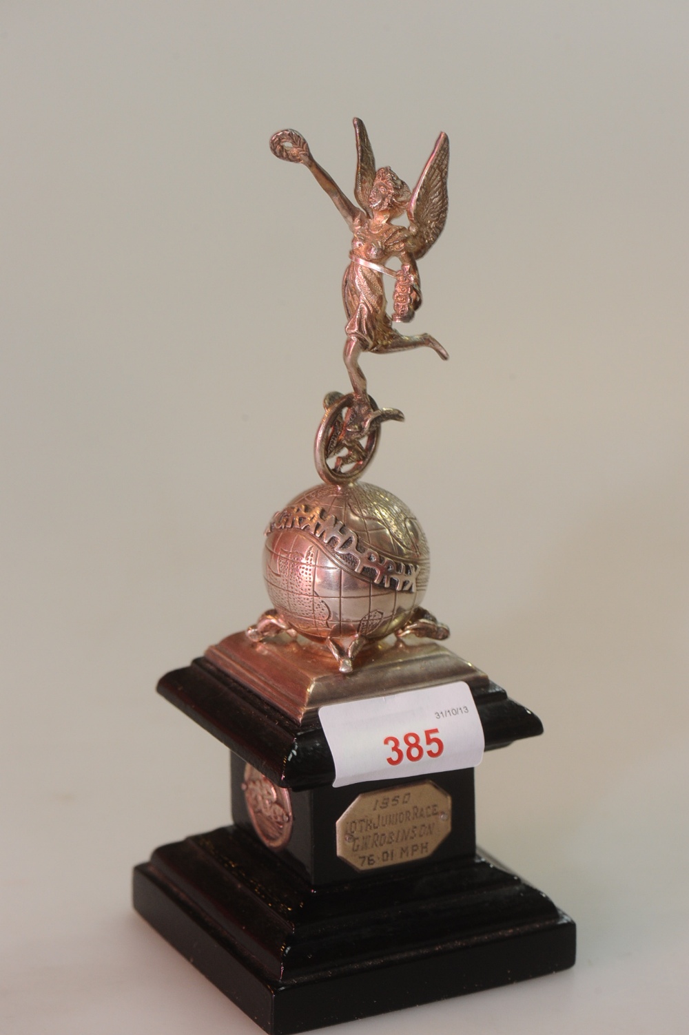 A silver (unmarked) junior trophy for the Manx Grand Prix, awarded to G.W. Robinson, 1950,with a