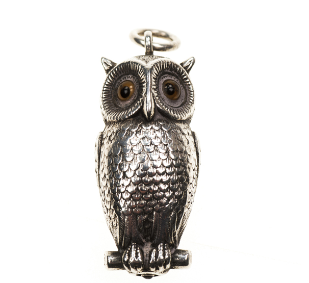 A SAMPSON MORDAN WHITE METAL OWL FORM PROPELLING PENCIL, c.1900, the bird with glass eyes, the