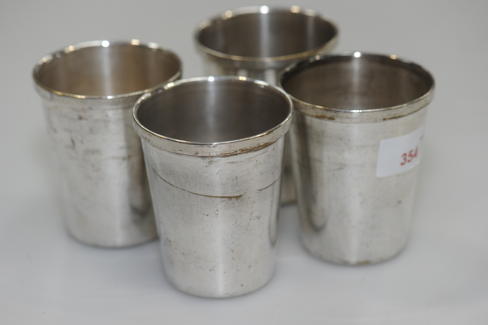 A set of four silver-plated travelling/sporting beakers, 19th century