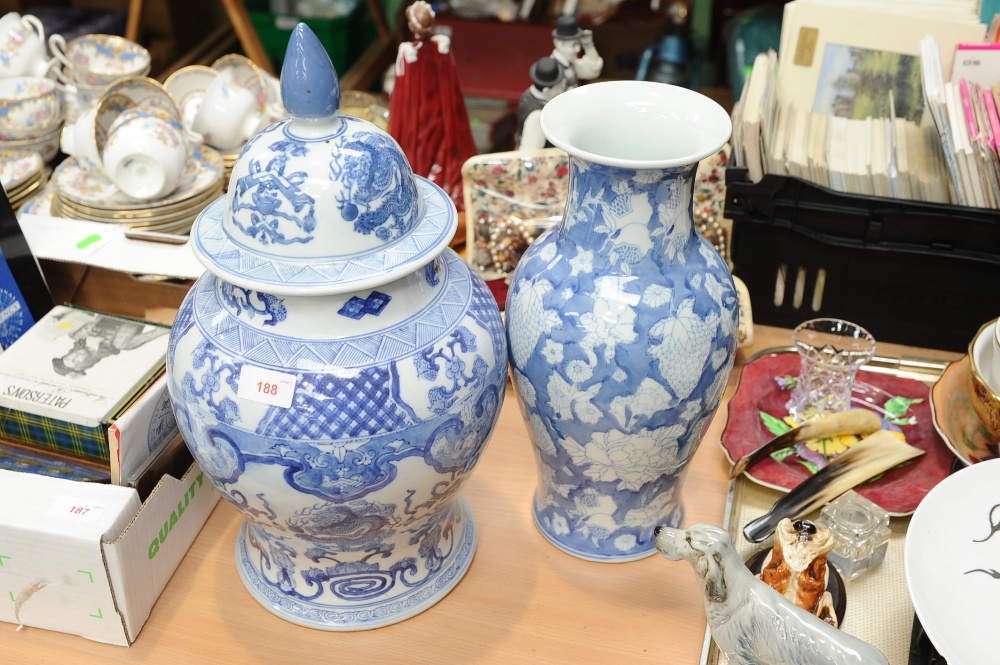 A Chinese blue and white baluster jar and cover tog. with a Chinese blue and white baluster vase (2)