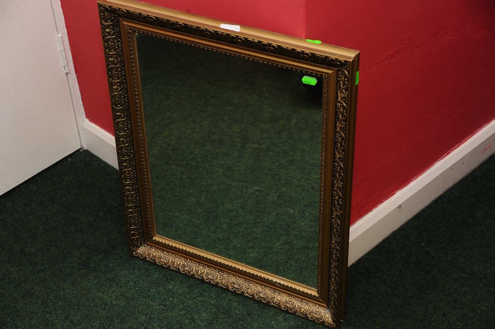 A gilt wood mirror