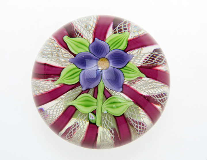 A 20th CENTURY FLOWER AND LATTICINO CROWN PAPERWEIGHT, with central purple flower and spurious "