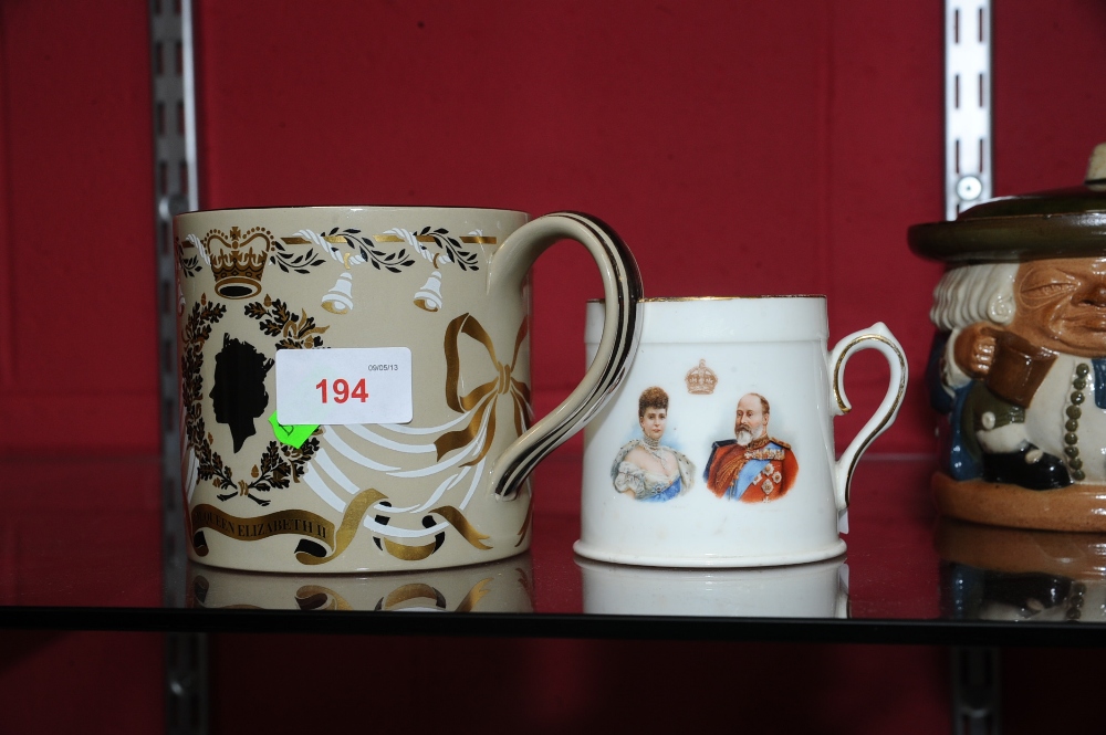 A Royal Doulton Coronation cup for Edward VII, June 26th 1902 together with a large Wedgwood