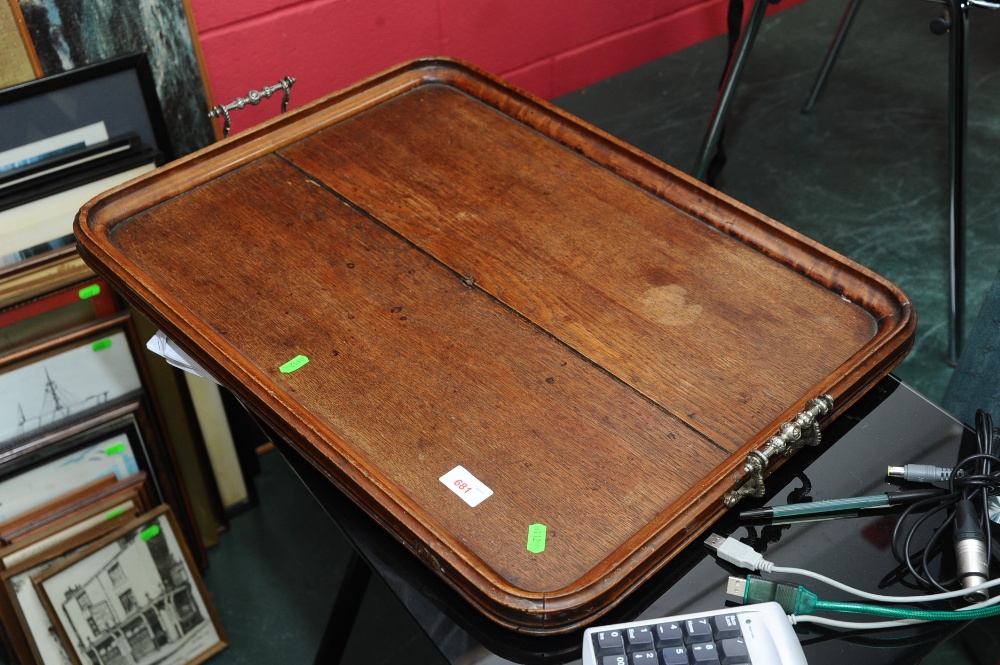 A large Edwardian oak twin-handled tray