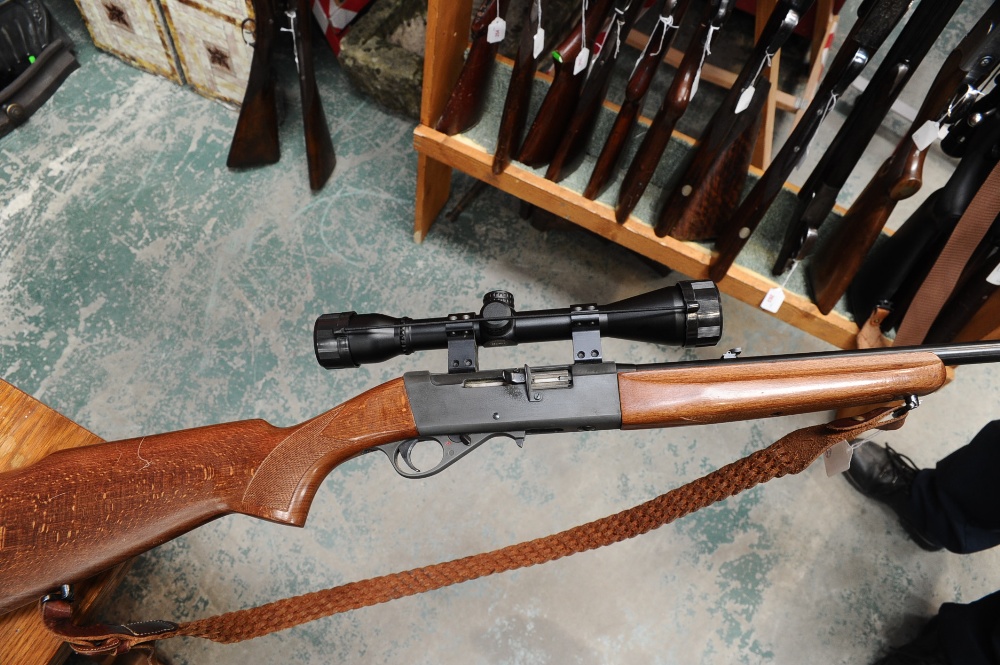 A 0.22 LR rim fire Anschutz model 525 semi-auto rifle, c/w Hawke Sport HD 4x40 scope, 4 magazines