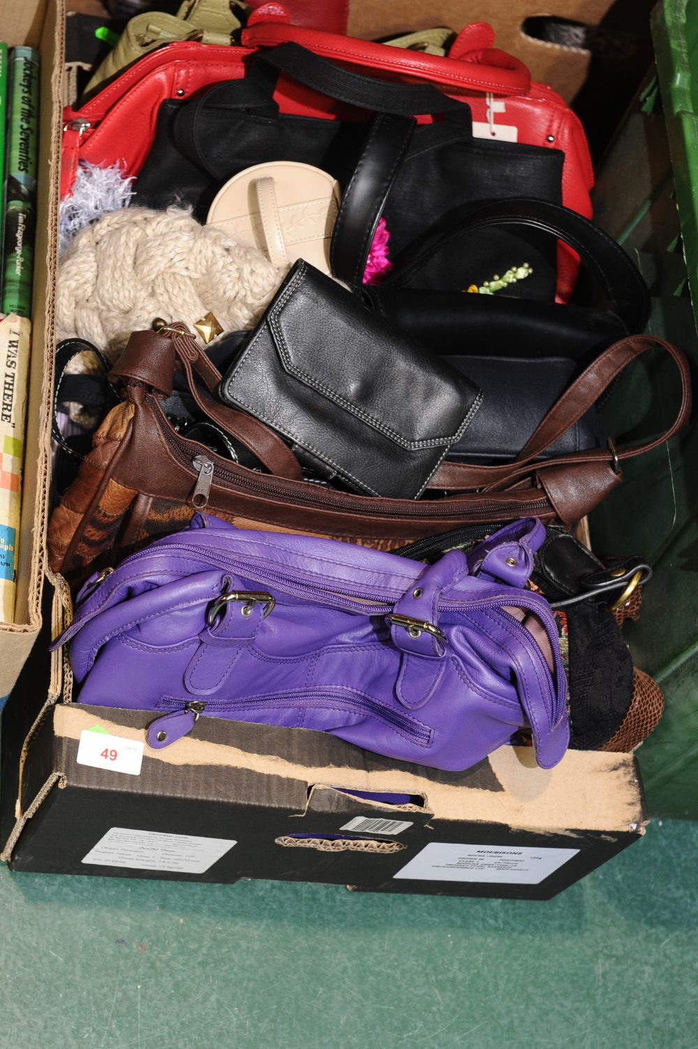 A box of vintage handbags