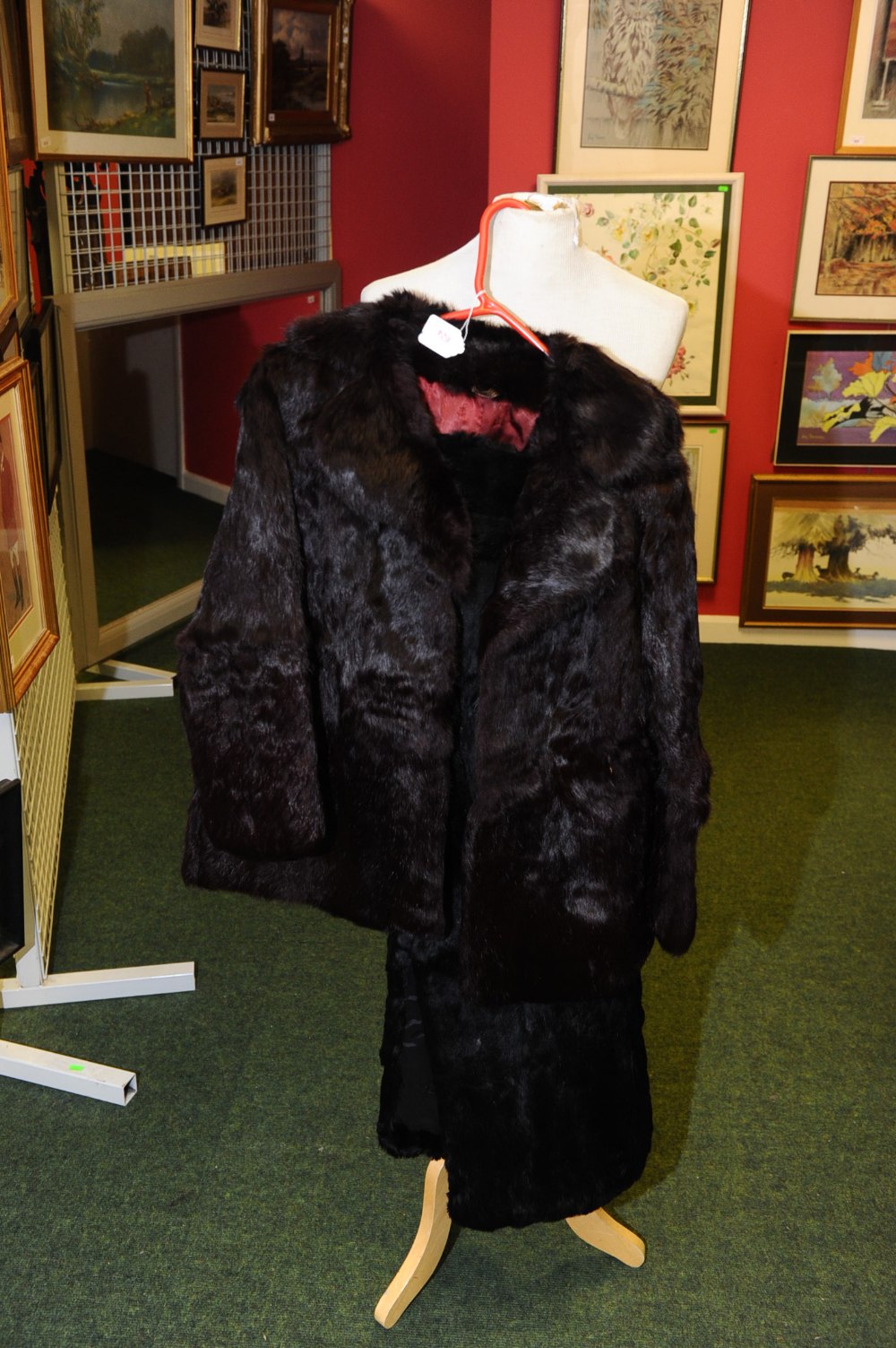 A dyed black rabbit fur stole, tog. with a dyed brown rabbit fur jacket