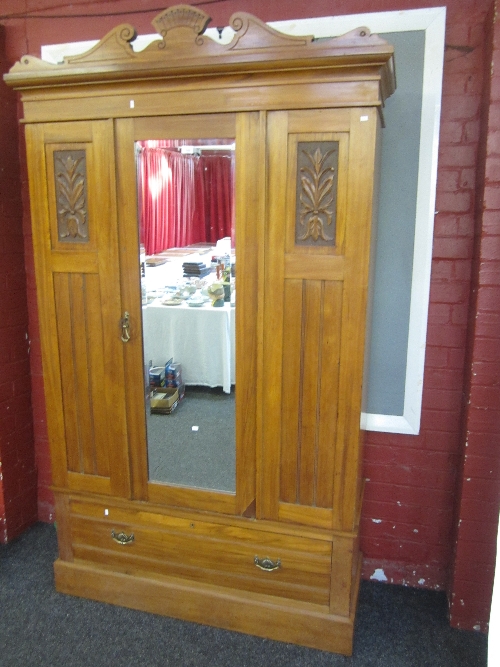 A VICTORIAN SATIN WALNUT WARDROBE, moulded cornice, bevelled mirror panel door, single drawer under,