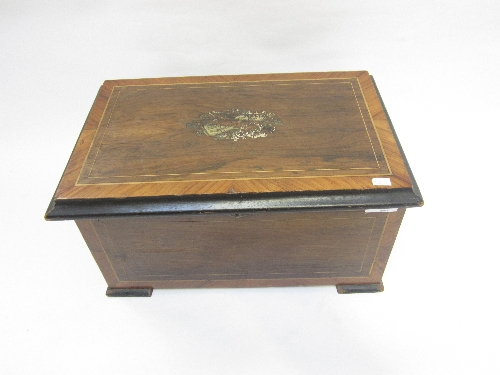 A SWISS MUSICAL BOX, rosewood and kingwood banded case with stringing and printed decoration,