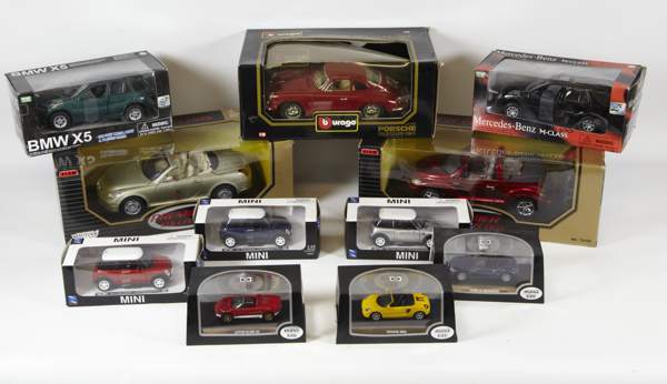 Collection of die-cast & plastic scale model vehicles, mint condition, boxed, boxes in mixed