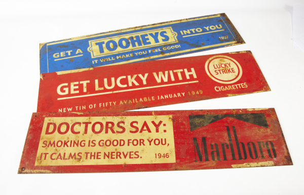 Enamelled advertising signs, all approx. 6cm x 15cm, comprising `Lucky Strike`, `Marlboro` & `