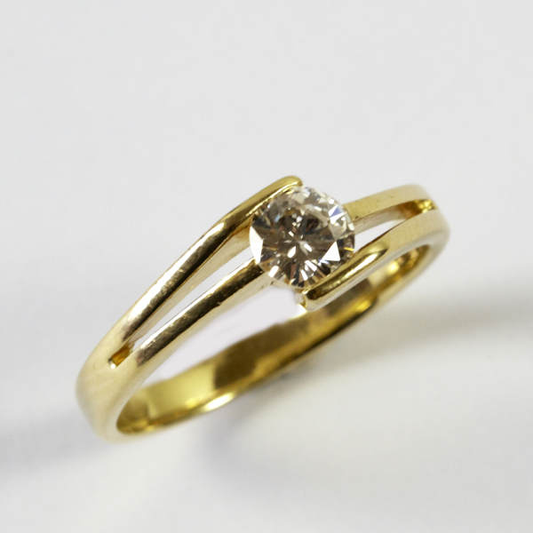 Ladies` diamond solitaire ring, comprising early brilliant cut stone, approx. 0.50 carats, tension