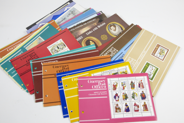 Channel Islands, stamp presentation packs, with a few other items (small lot) Care! High