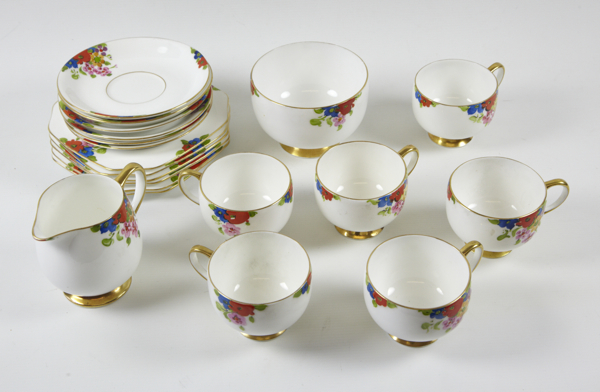 Carlton Ware hand painted tea service, pattern no. 4693, small groups of flowers to edges, gilt