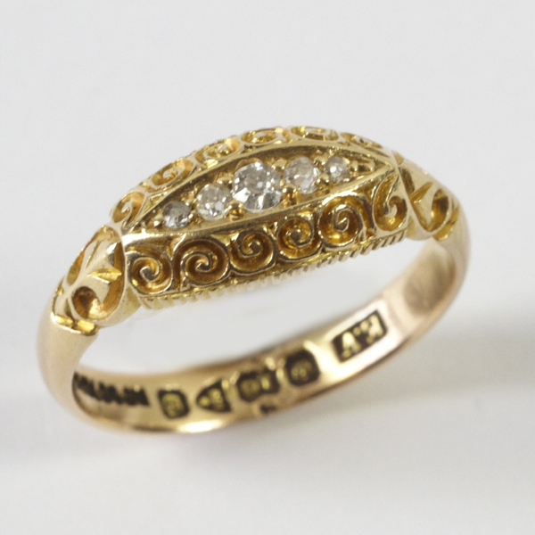 Ladies` antique diamond ring, comprising five graduated old cut stones, in boat shaped traditional