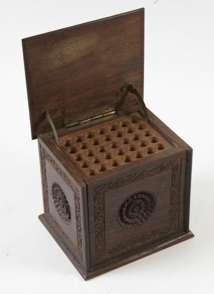 Antique wooden cigarette dispensing box, approx. 110mm square, ornate carved patterns to all sides &