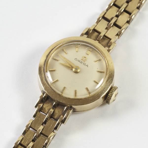 Ladies` vintage Omega wristwatch, jewelled movement, "working" order, round dial, approx. 14mm, with