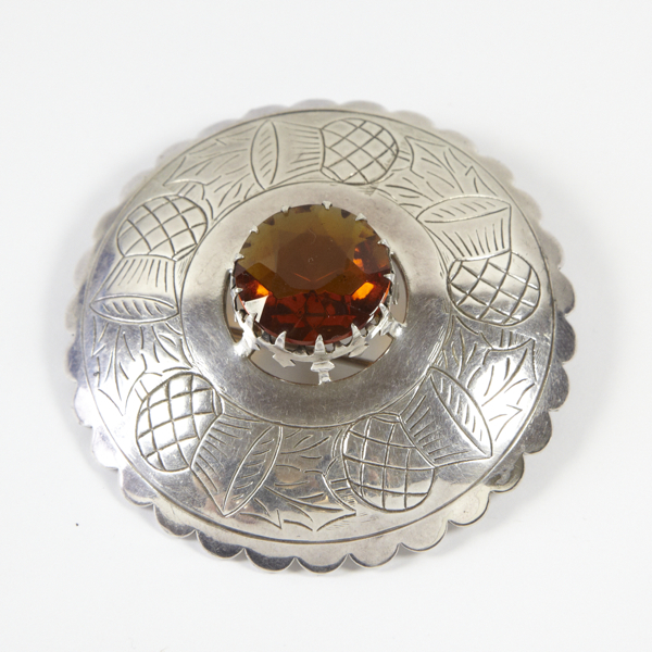 Large silver plated plaid brooch, approx. 80mm diameter, scalloped edge with engraved thistle