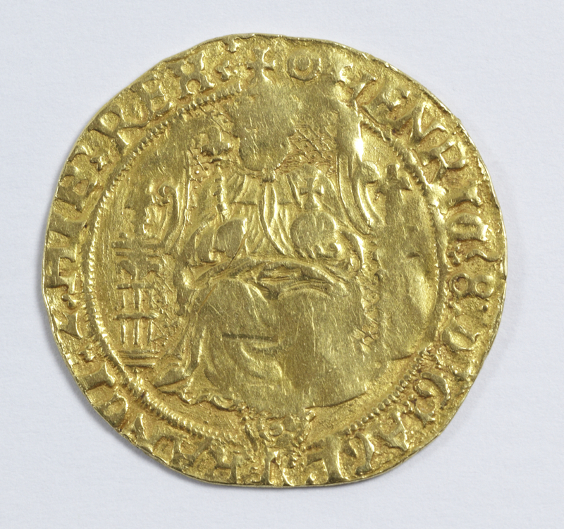 Henry VIII (1509-1547), gold half sovereign, Tower mint, mm pellet in annulet, 3mm scratch to robe