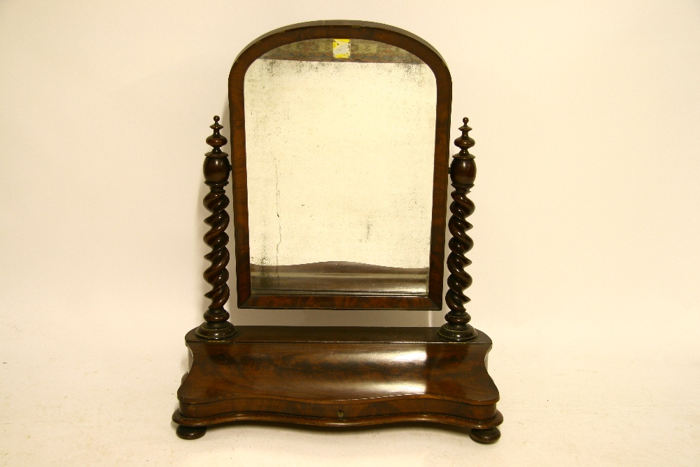 A mid-Victorian mahogany large rectangular swing toilet glass with rounded top, barley-twist side