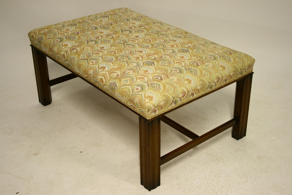 A good quality reproduction mahogany large rectangular stool in the late 18th century style, with