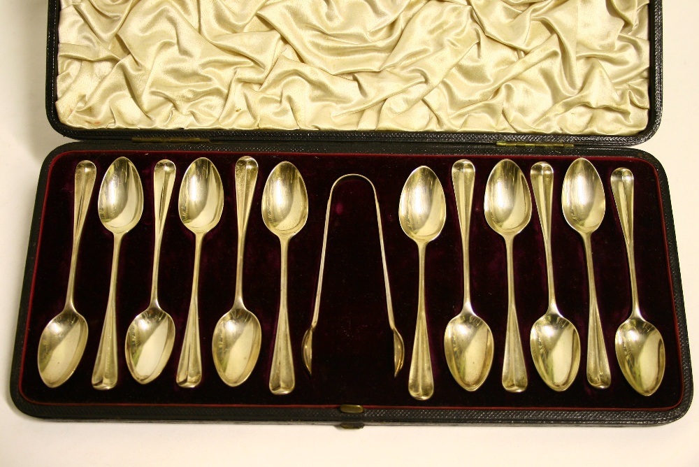 A set of twelve late Victorian Hanoverian rat-tail coffee spoons & pair of matching sugar tongs;