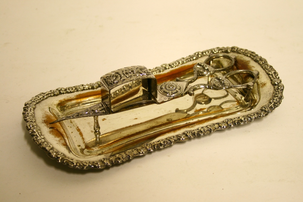 A pair of early 19th century Sheffield plated scissor-action candle snuffers, & a ditto oblong