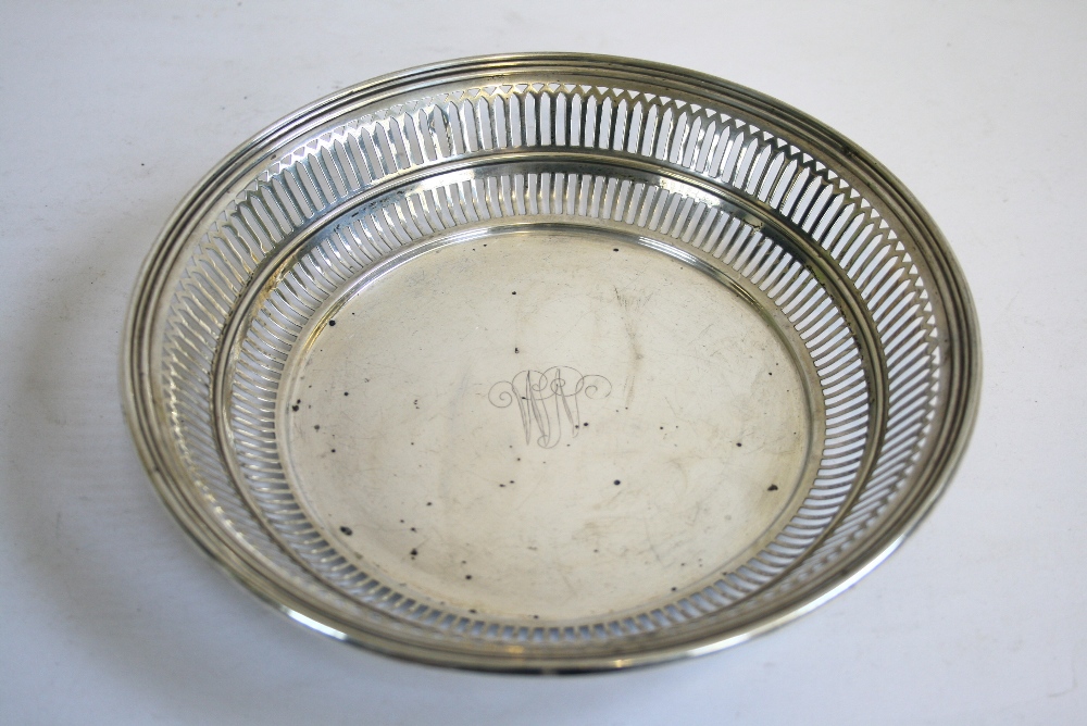 A Sterling circular shallow dish with pierced double border, engraved initials to centre; 7½"