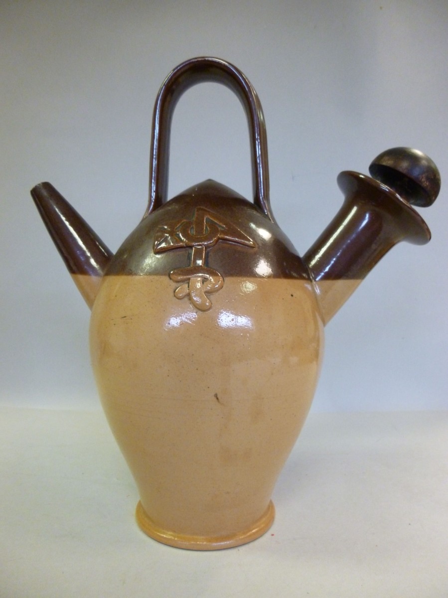 A two tone brown glazed stoneware `Old Sarum Kettle` made exclusively for Watson & Co, Salisbury and