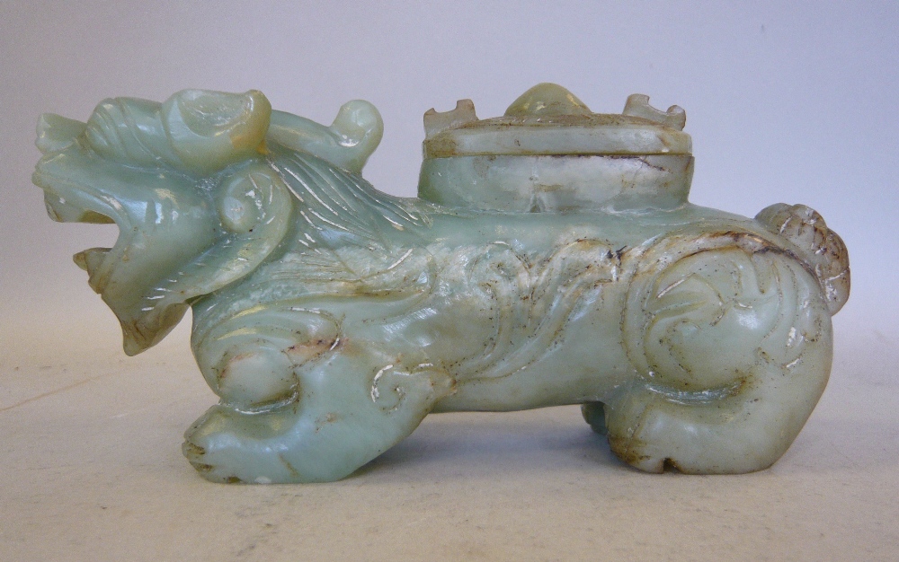 A Chinese carved agate/jadeite censer, fashioned as a mythical beast, a covered box on it`s back 6.