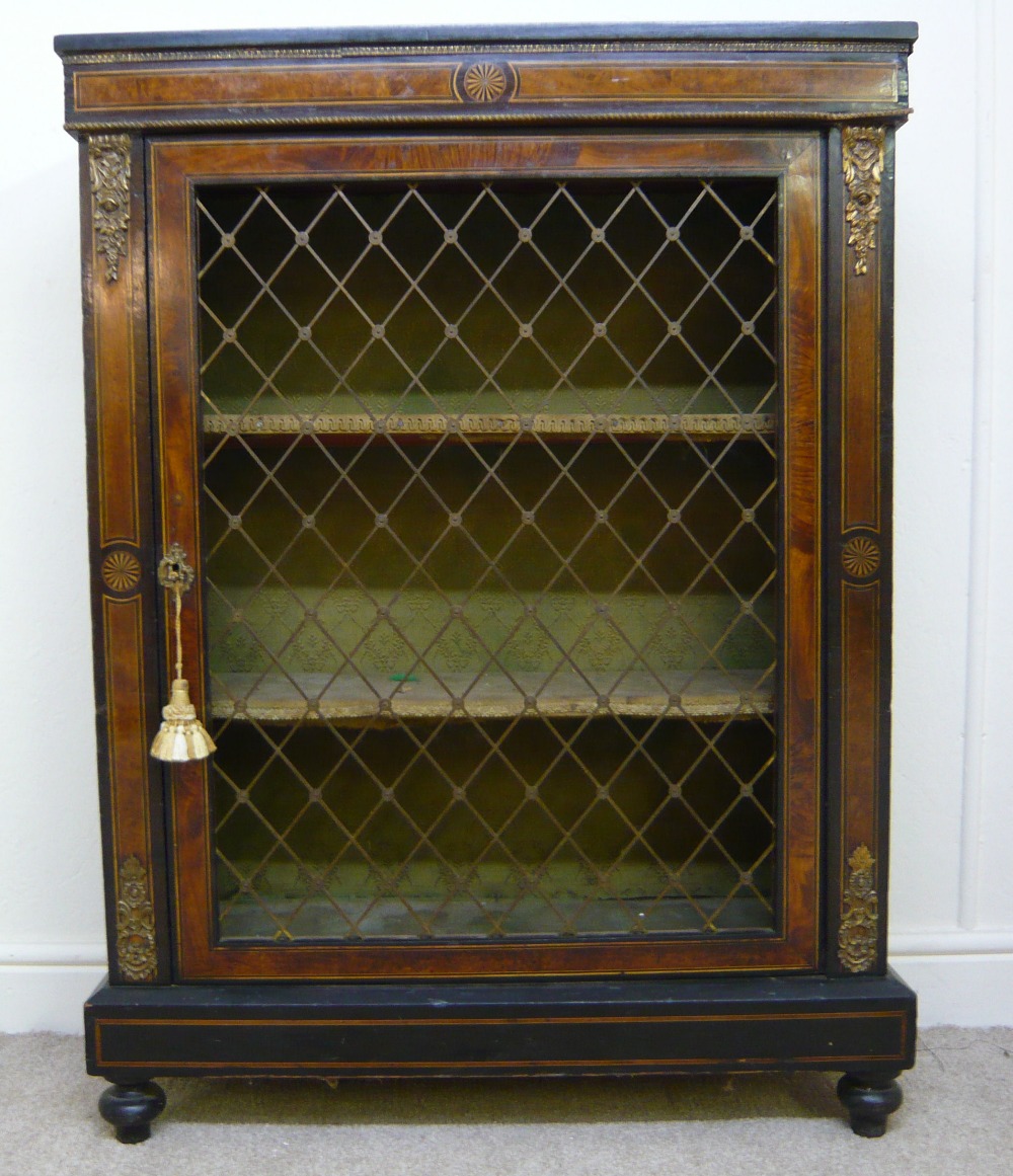 A late Victorian string inlaid ebonised and walnut pier cabinet with marquetry ornament and