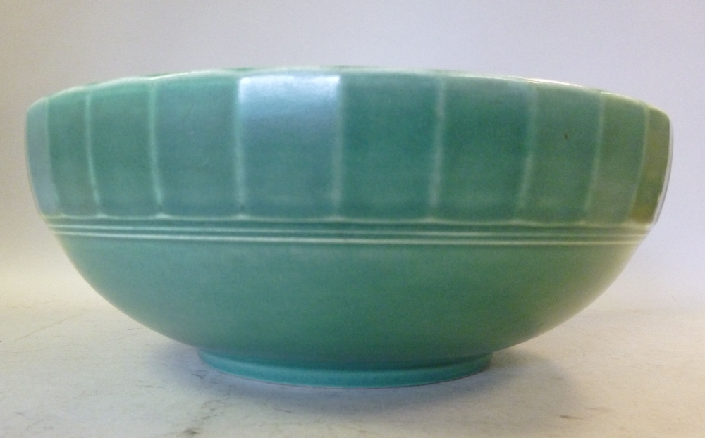 A Keith Murray Wedgwood satin green glazed pottery straw bowl pattern no.3815 bears impressed and