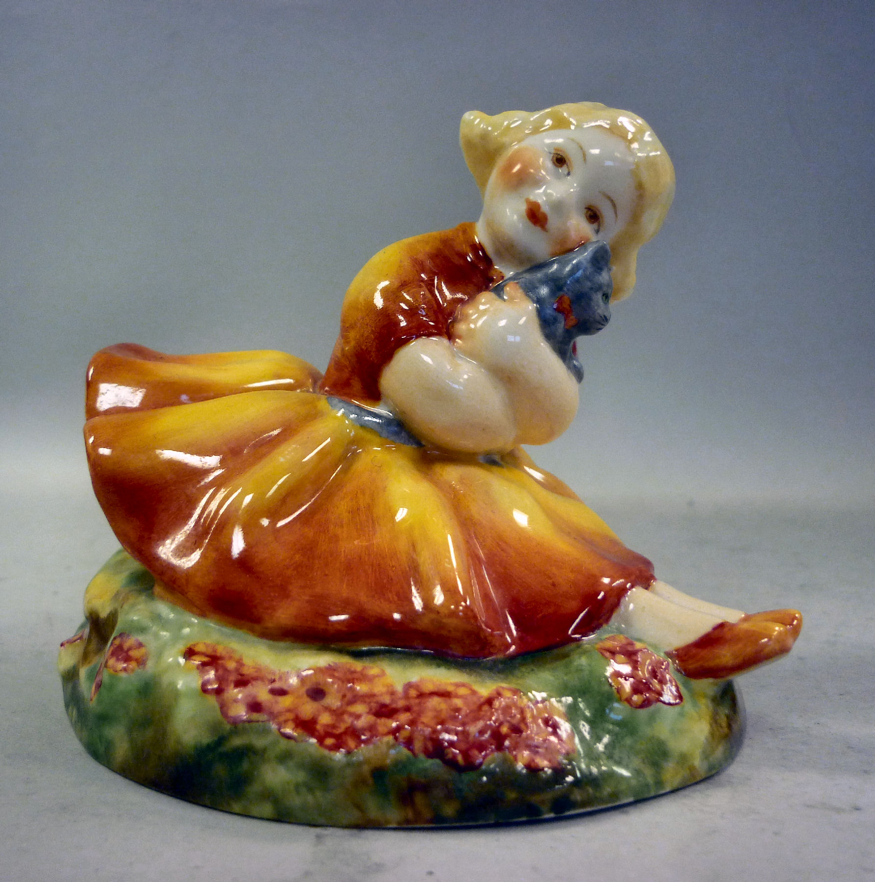 A Royal Worcester china figure `Marigold` No.2932 modelled by Anne Acheson bears a date cypher for