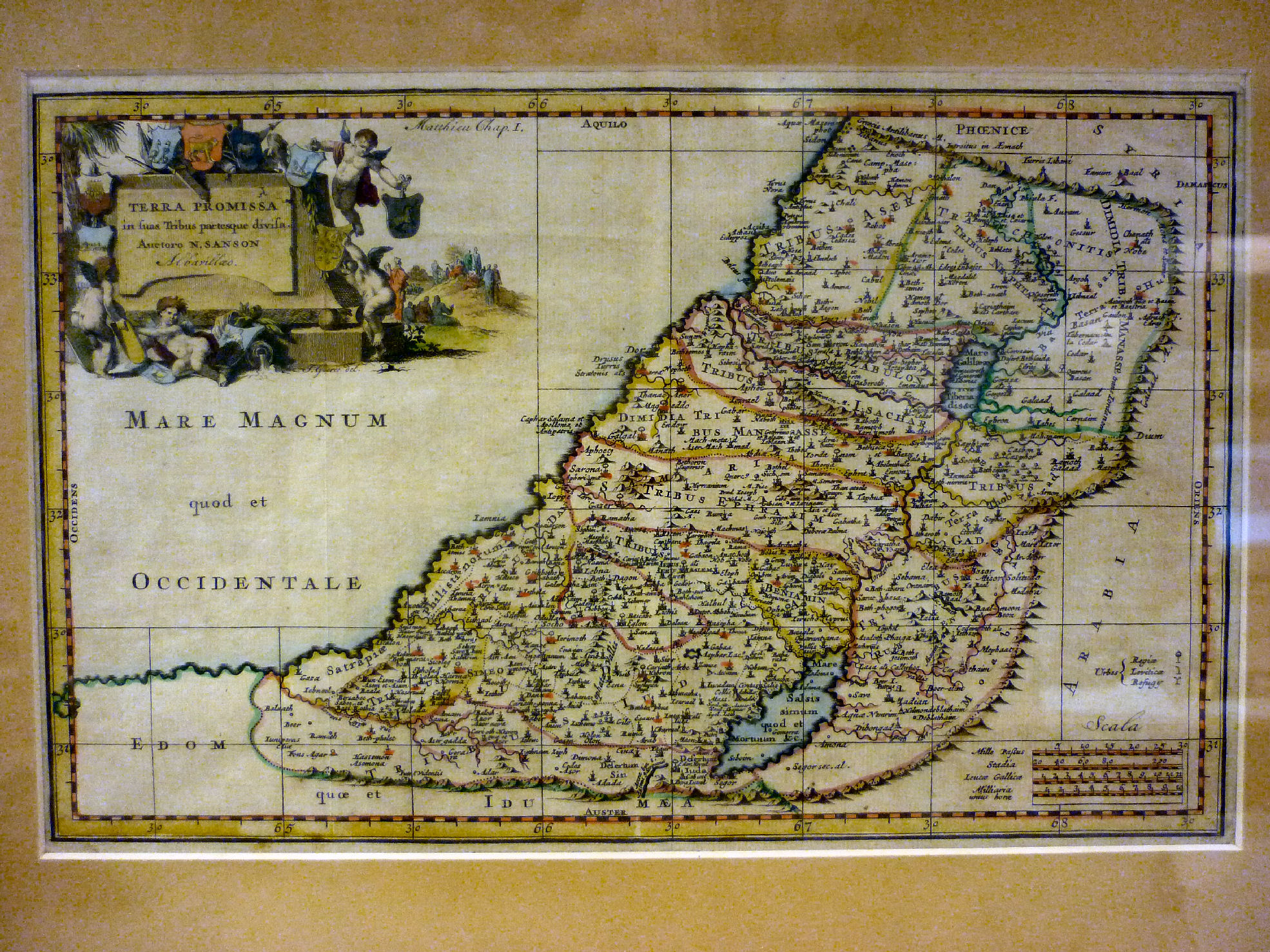 A 17thC Nicholas Sanson coloured map `Terra Promissa` incorporating a figural title cartouche and