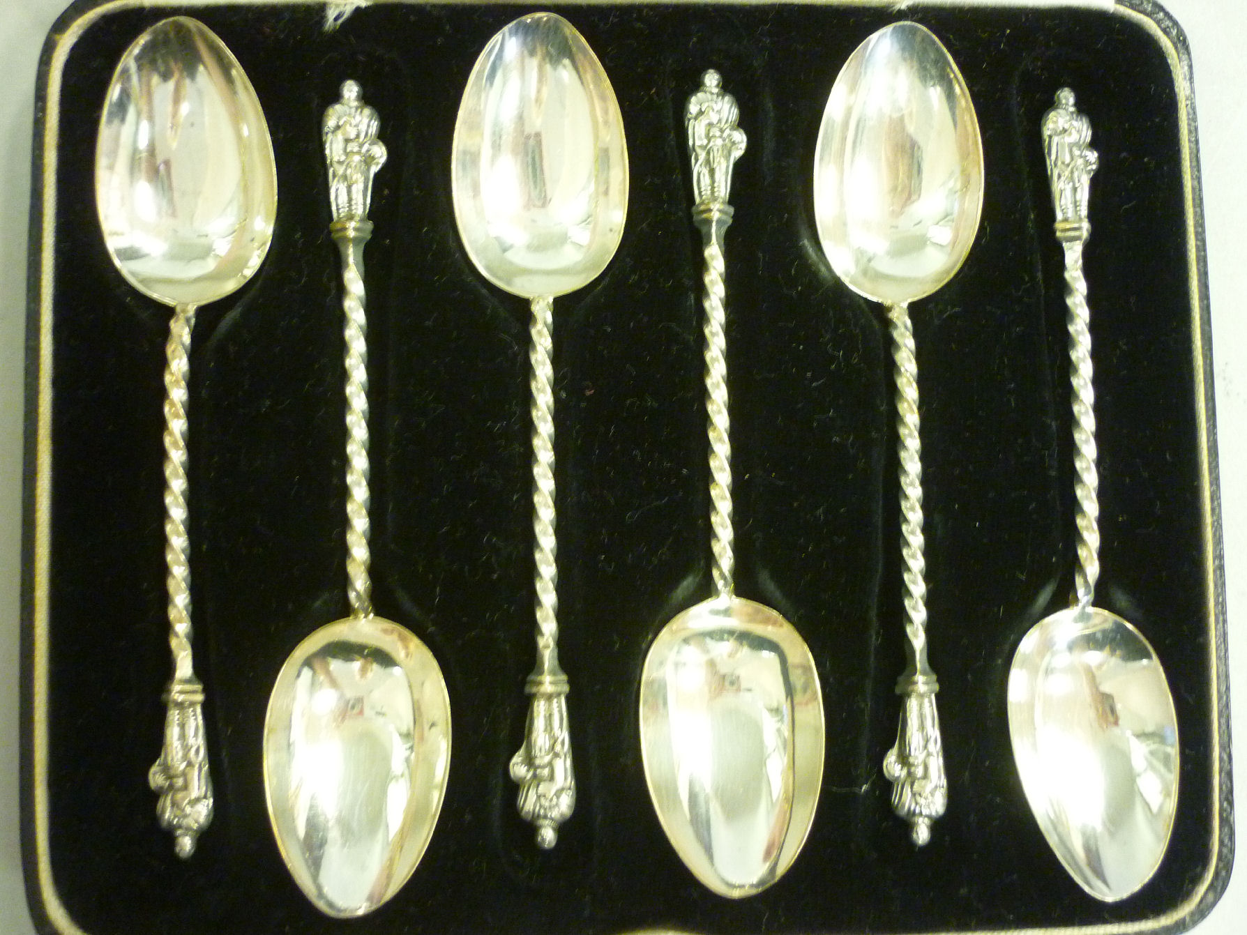 A set of six late Victorian silver apostle teaspoons on twist stems George Unite Birmingham 1888