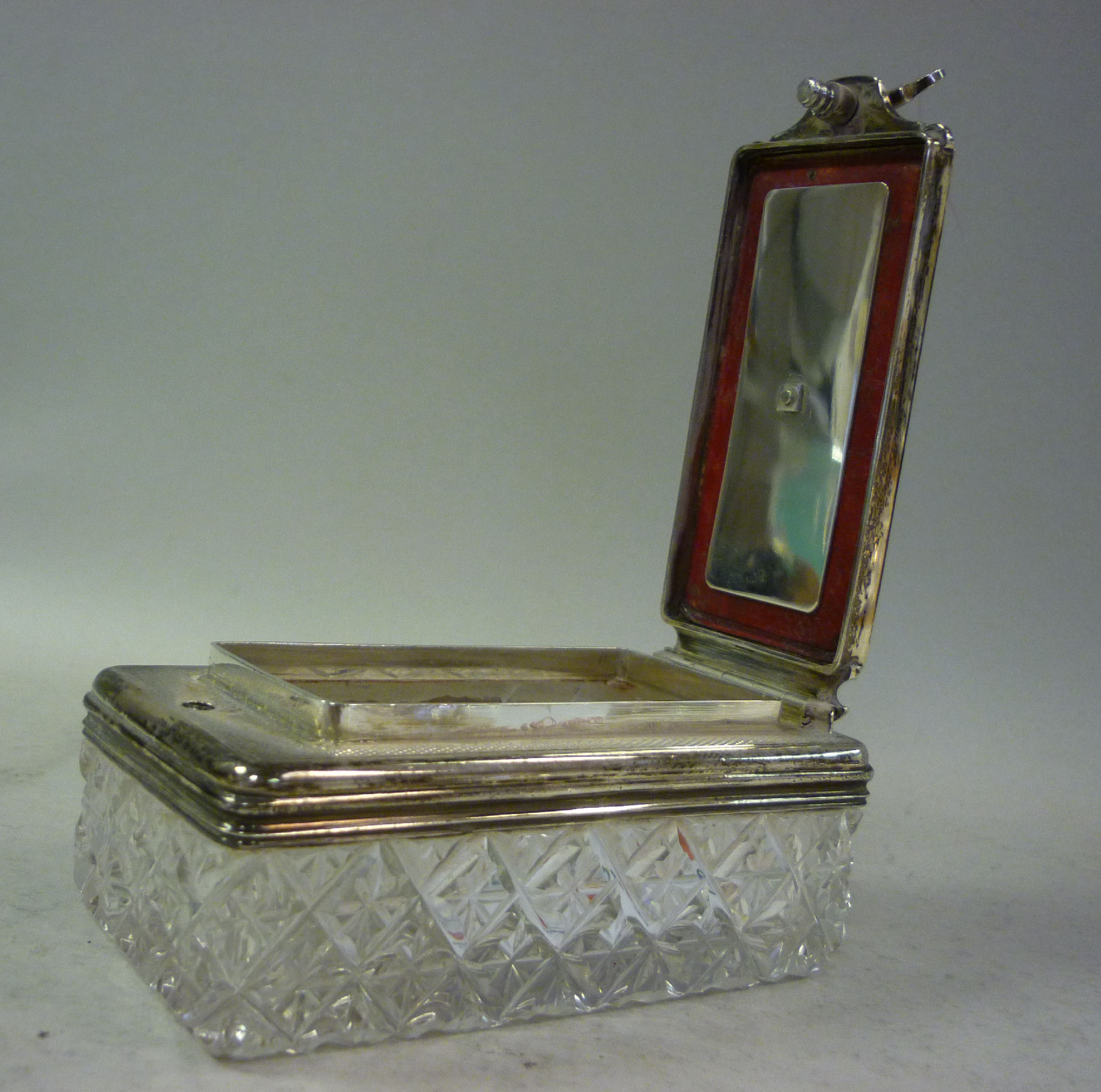 An early 19thC gentleman`s slice, rosette and diamond cut toiletry box with an applied silver collar