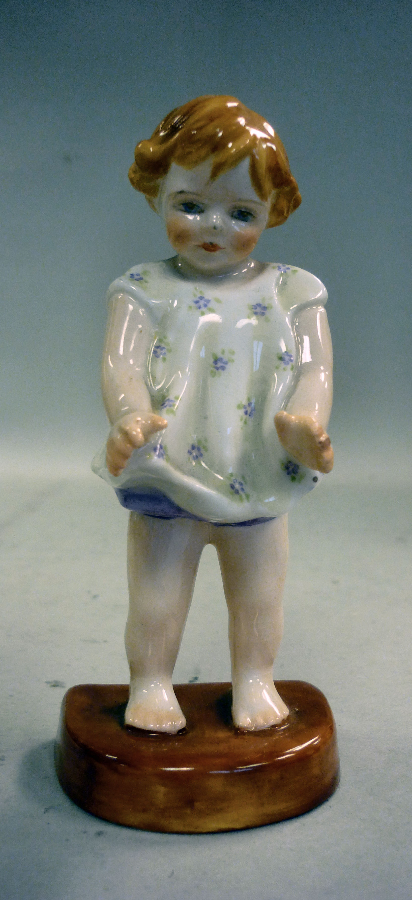 A Royal Worcester china figure `Joan` No.2915 modelled by FG Doughty bears a date cypher for 1935