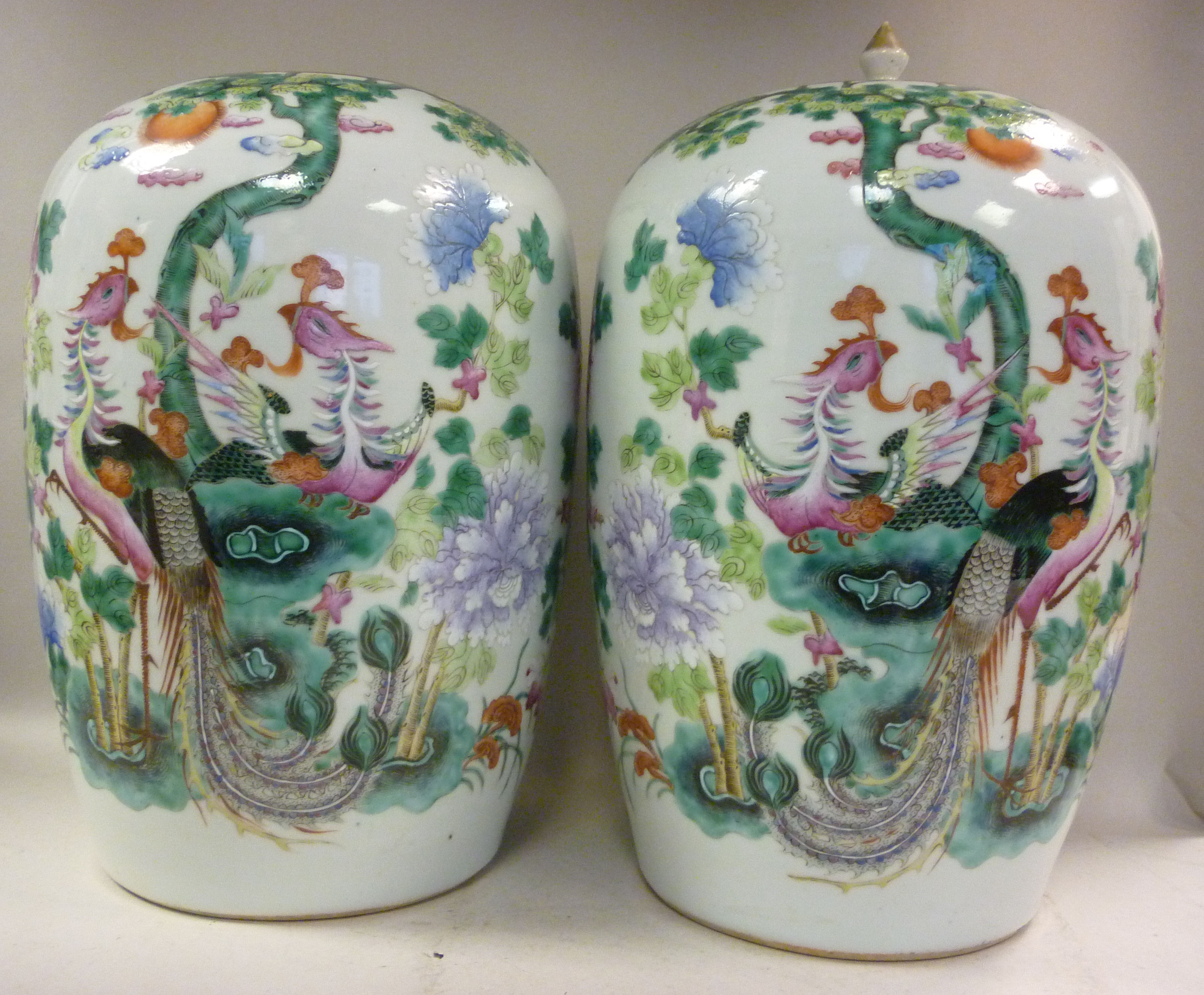 A pair of late 19thC Chinese porcelain jars of baluster form (one with a flush fitting cover and