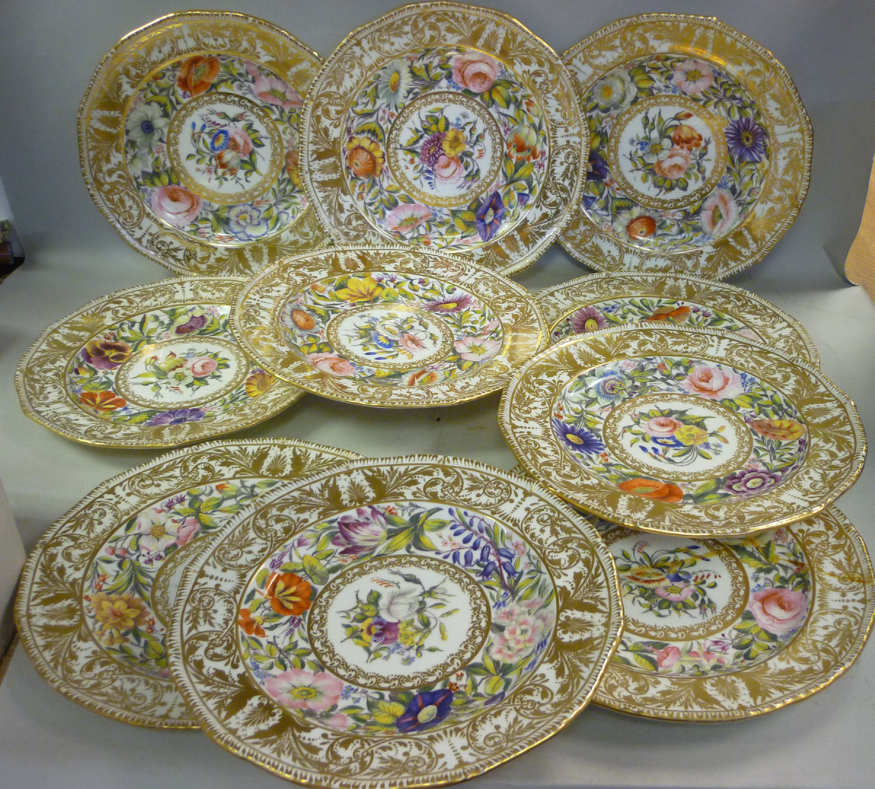 A set of ten late 19thC Derby, Stevenson & Hancock porcelain dessert plates with wavy borders,