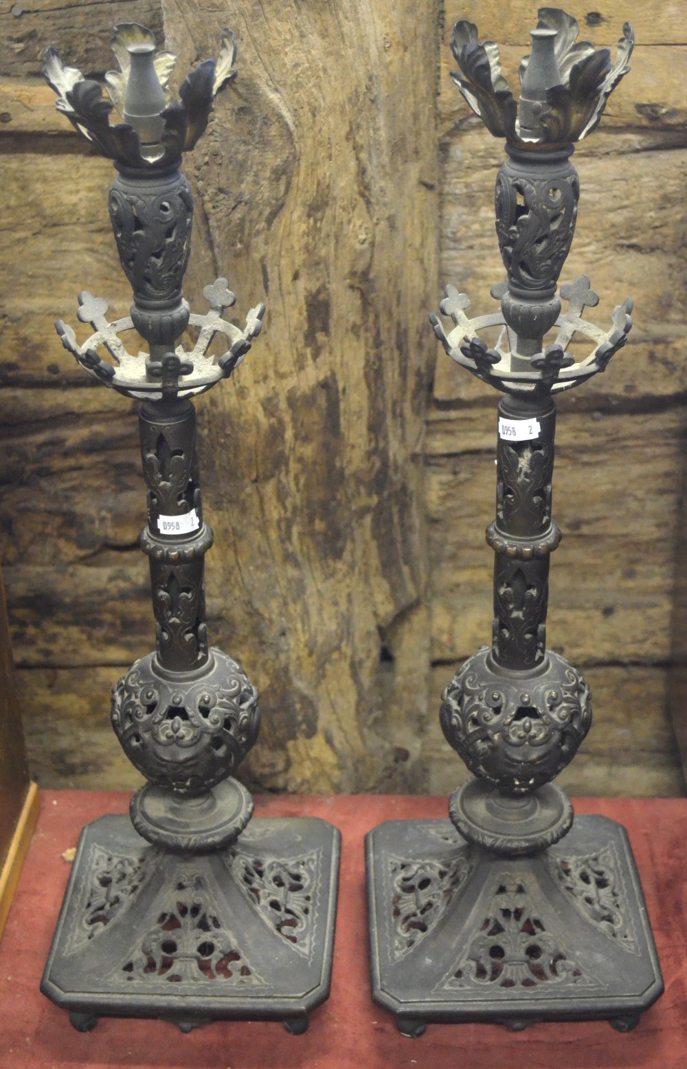 A pair of Victorian brass gas-lamp bases with original burner-nozzles, on pierced stems and square