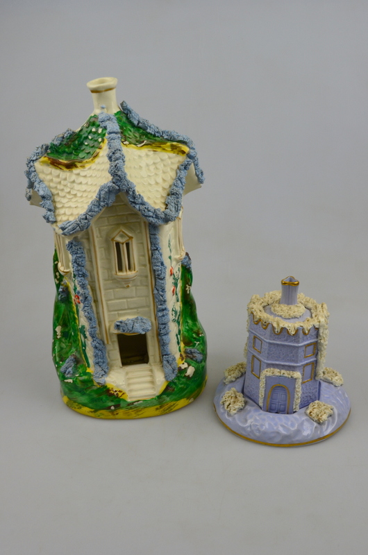 A mid 19th century Staffordshire pastille burner in the form of an octagonal tower with central