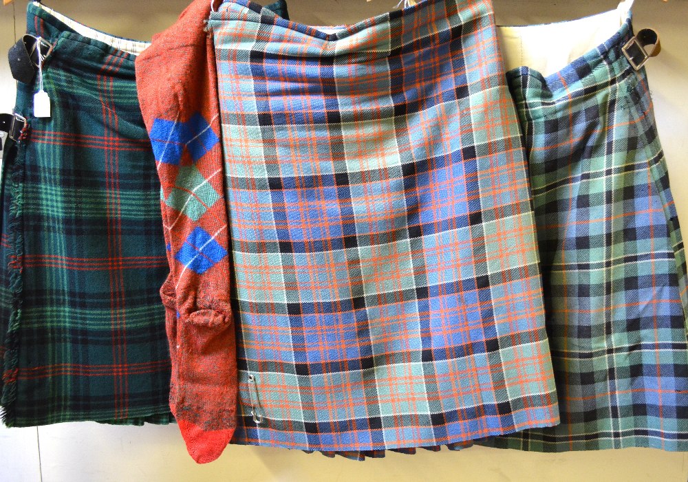 Two Loch Carron cloth tartan kilts, one being the MacDonald of Clan Ranald (with matching socks),