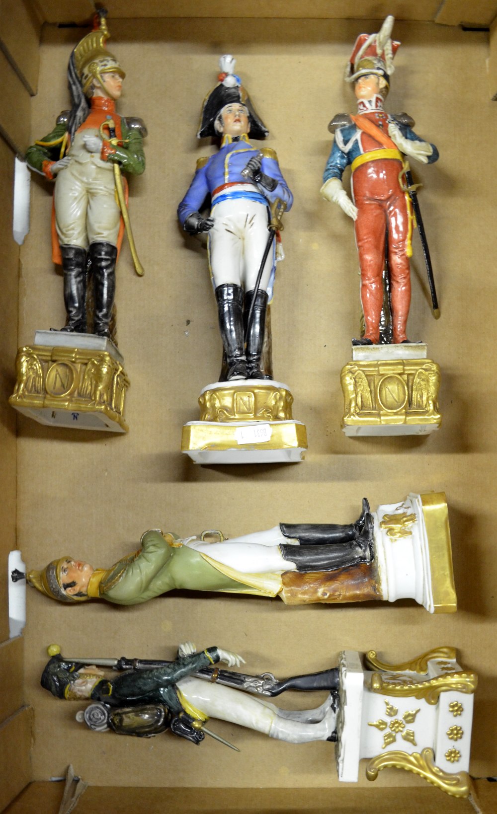 Five hand painted Naples porcelain figures of Napoleonic soldiers in various uniform, 29 cm high (5)